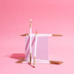 Gold White Double Dipped Tall Cake Candles Pink Background